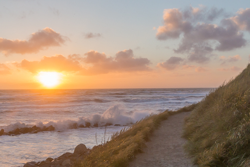 Sunset and crashing waves