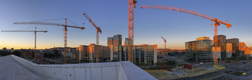 Panorama with a lot of cranes, they are building a huge new library and the new Munch museum here