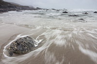Waves crashing onto the beach