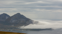 The next morning I watched the fog roll in like a waterfall behind Tromvik