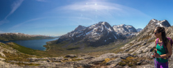 View towards Store Blåmann and Orvasstinden, and above Hannah you can see the top of Middagsfjellet