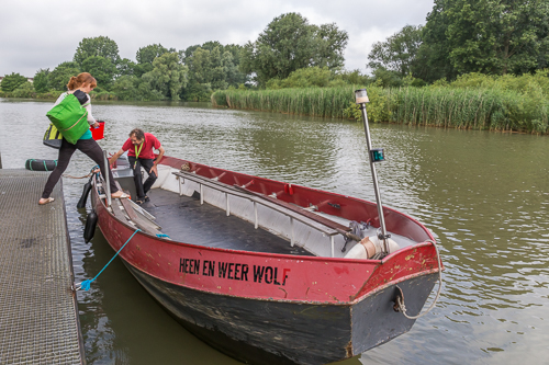 Laura getting on board the next morning. The boat is called Heen en Weer Wolf, a character from a children's book. In English the character is called Tell me Wherewoulf