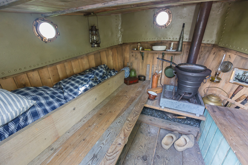 Inside a typical boat used by the willow workers - two people could sleep here, even though it's tiny!