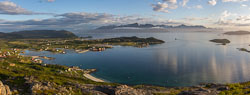 Panorama of Brensholmen, the ferry just departed towards Senja (the island in the background)