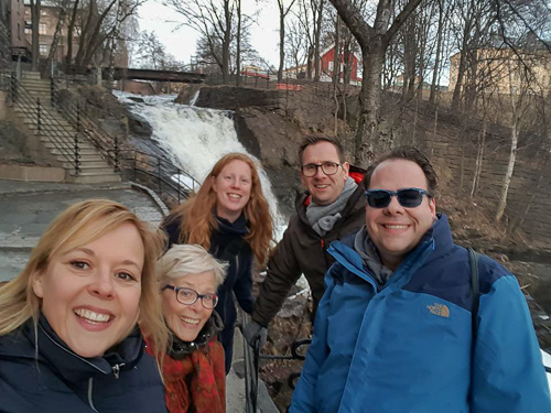 All of us in front of the waterfall at Akerselva