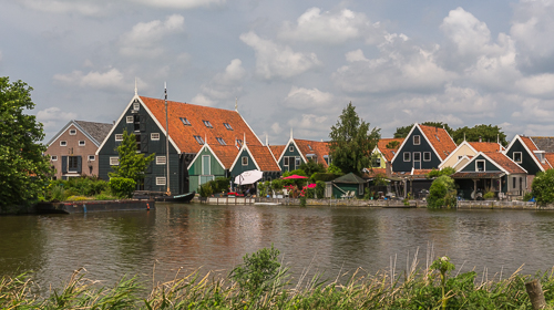 The typical green wooden houses of this region