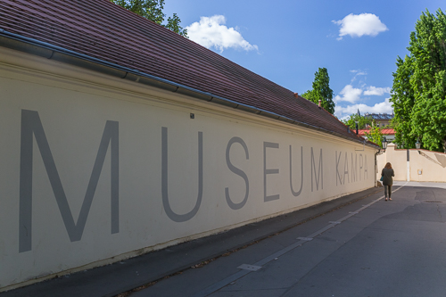 My sister walking past the Kampa Museum