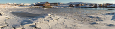 The frozen lagoon and Sommarøy Arctic Hotel. We were staying in one of the cabins