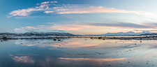 Panorama of the sunset at Kvaløysletta, with Tromsdalstinden to the left