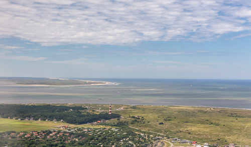 The lighthouse at Ameland, Terschelling in the distance