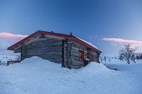 Sioskuru Open Wilderness Hut at sunset