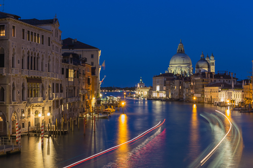 View from the bridge with boats passing underneath