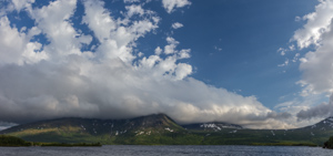 Impressive clouds hiding the mountain tops on the other side of the lake