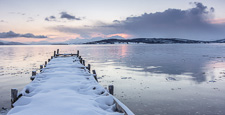 An accidental panorama, I found out that 2 images I took could be stitched :) A big snow shower to the right