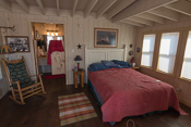 Inside our cosy cabin, with swing doors to the bathroom :) 