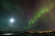 Aurora and partial moon halo